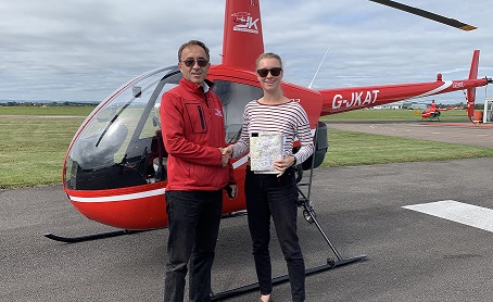 Another helicopter pilot has passed her PPLH test with the James Kenwright training school.